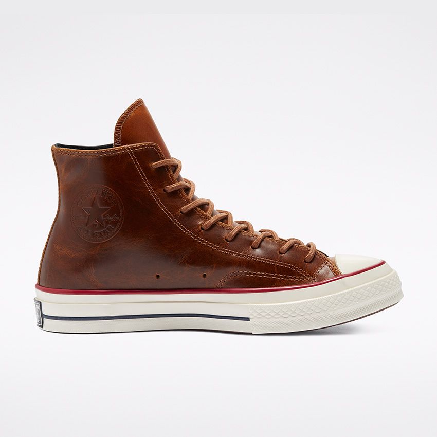 brown leather converse high tops