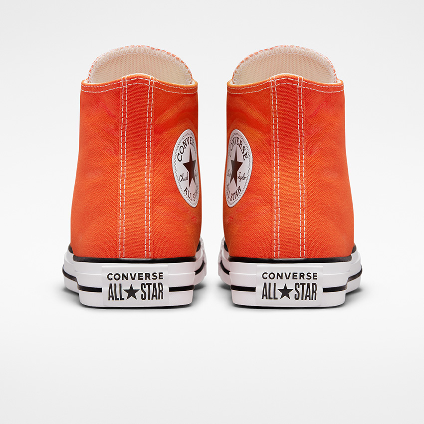 White black and orange converse top