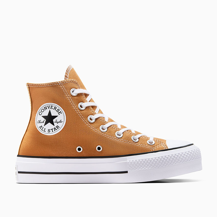 Girl wearing white high top converse clearance
