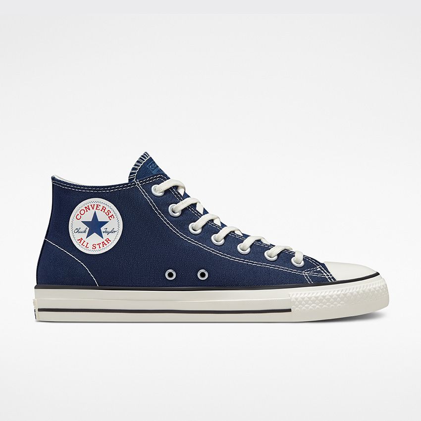 Chuck Taylor All Star Pro Canvas Mid Top in Midnight Navy/Black/Egret ...